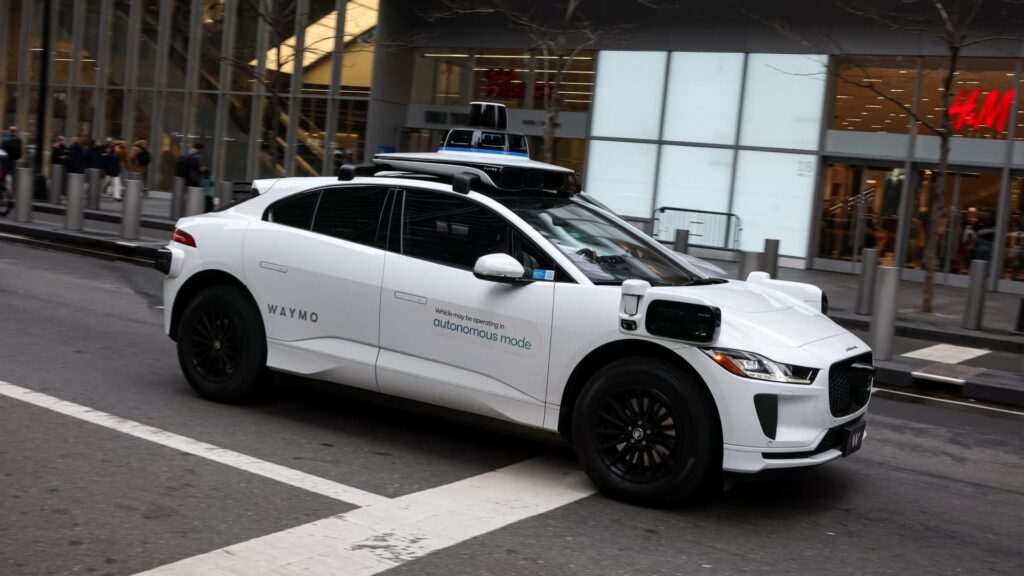 Waymo crosses 450,000 weekly paid rides, widening Tesla lead