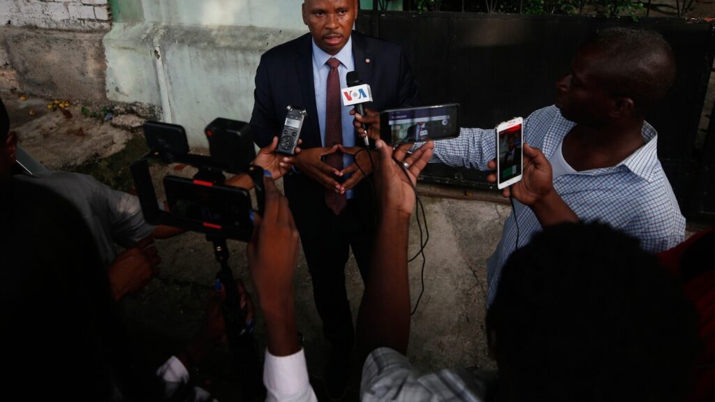 Haiti senator arrested on suspicion of working with gangs to attack a village