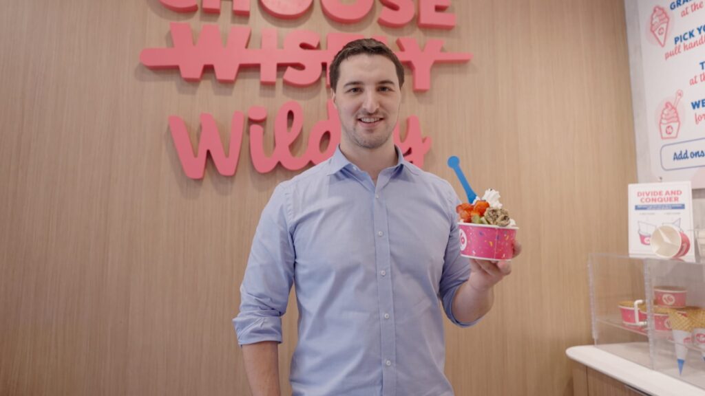 He bought a frozen yogurt shop at 23 with no experience—now he’s CEO