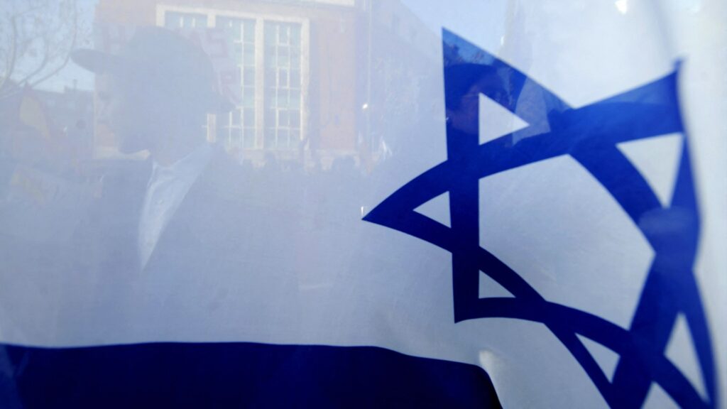 Why were Israeli flags erected along Hastings’ seafront?