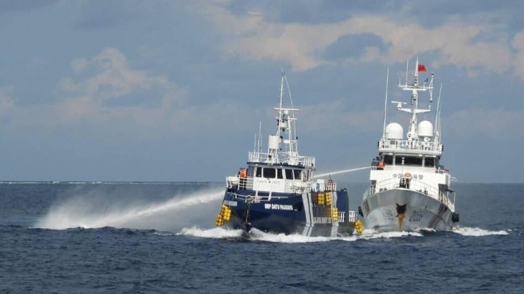Chinese coast guard rams and damages a Philippine vessel off an island in the South China Sea
