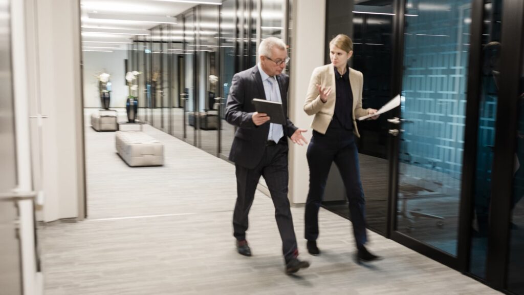 Economists say job market is cooling but ‘not falling off a cliff’