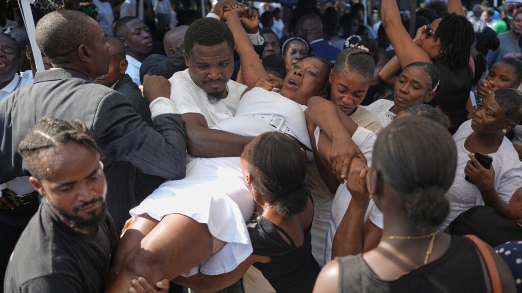 A town in southern Haiti mourns its own as it reels after Hurricane Melissa
