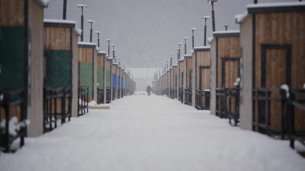 Cortina’s mobile-home Olympic Village sits in close contact with nature