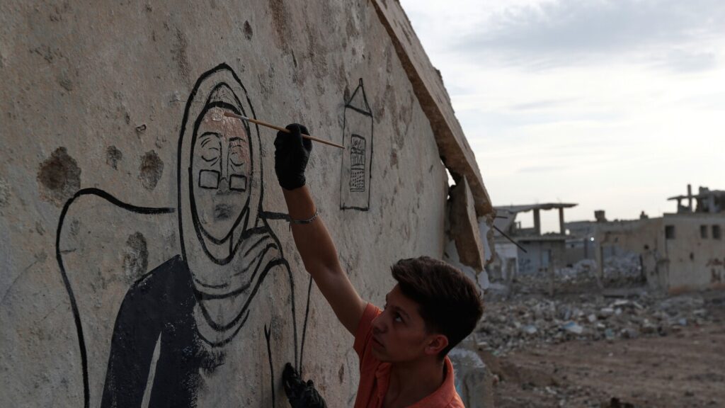Graffiti mural in Daraya honors families lost during Syrian siege