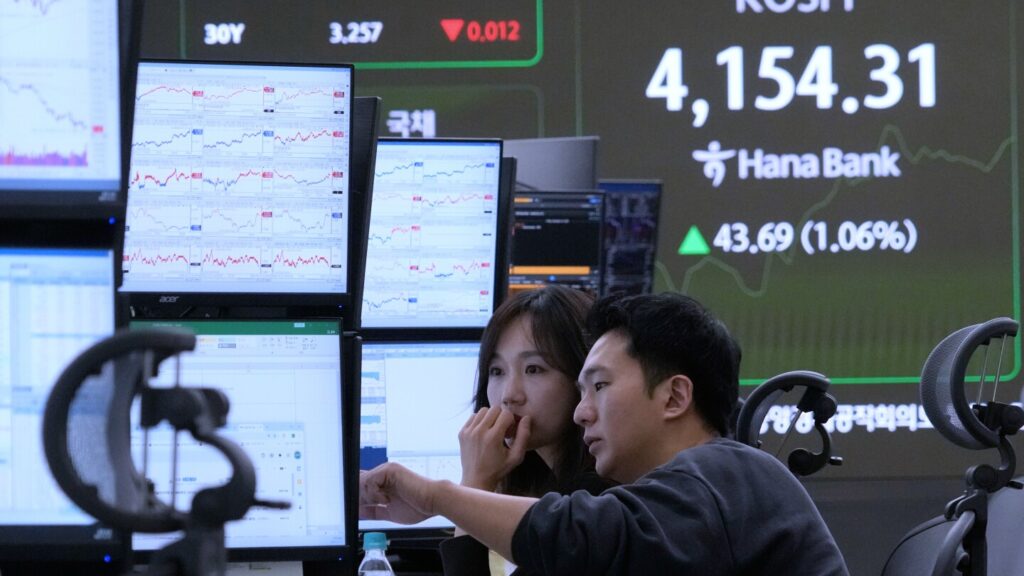 World shares track Wall Street’s rise to records despite AI bubble worries
