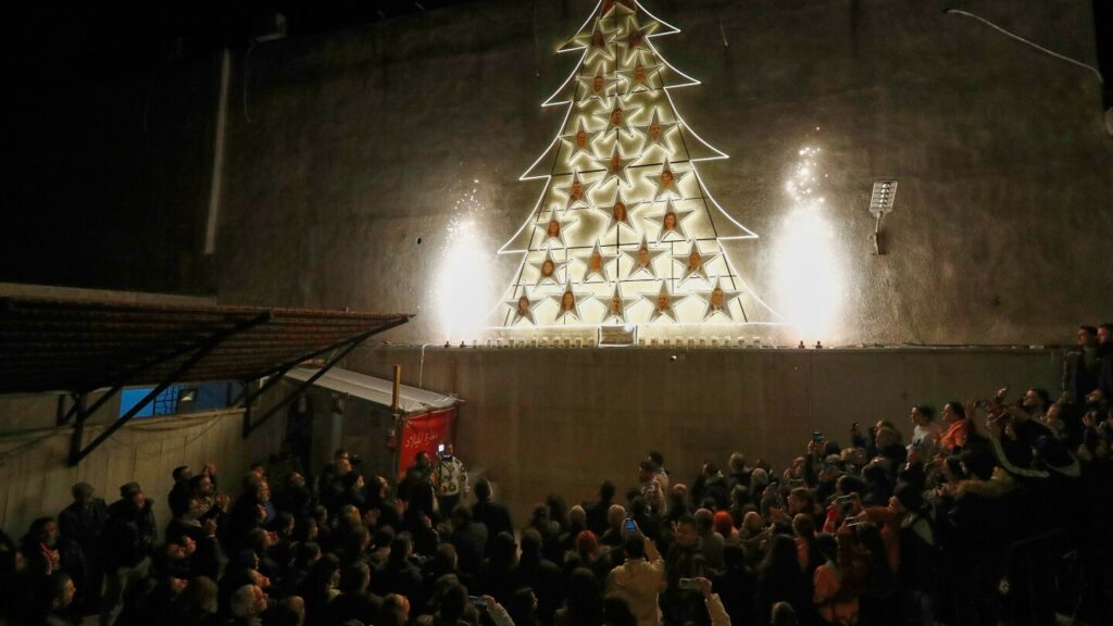 Syria church honors victims of suicide attack in Christmas mass