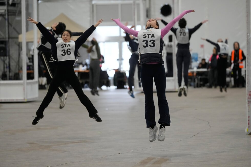 Volunteers prepare for Milan Cortina Winter Olympics at San Siro stadium